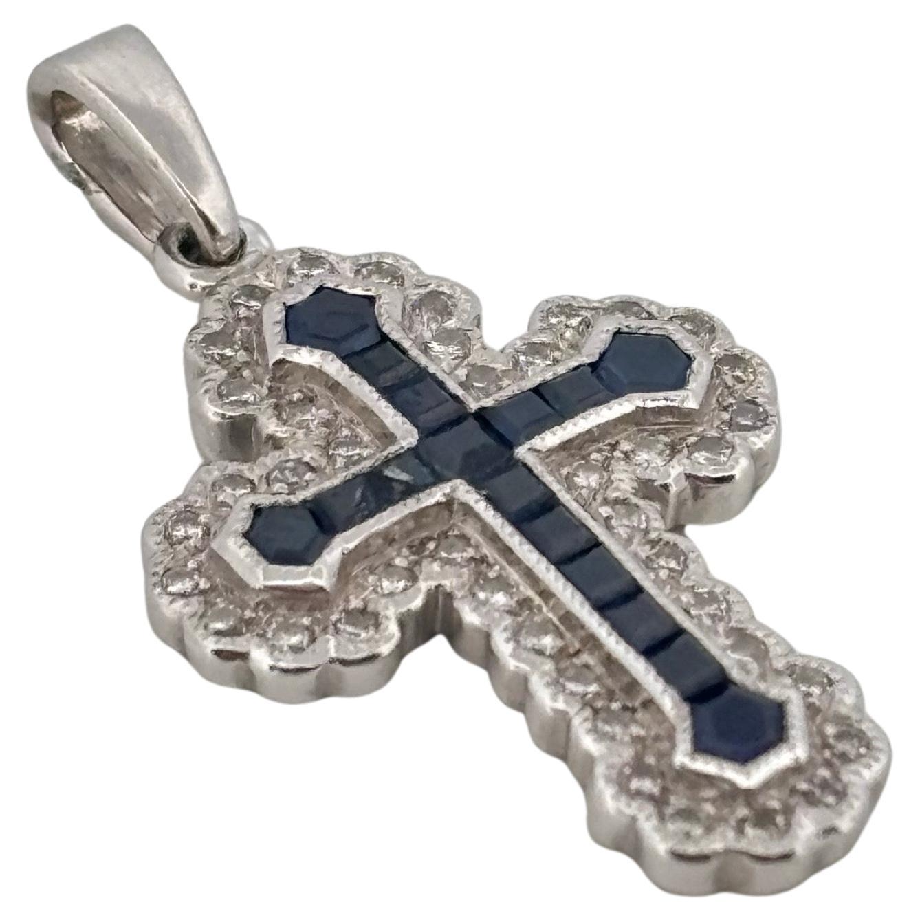 This elegant cross pendant is finely crafted in luminous 14k white gold, combining timeless faith symbolism with refined design. Measuring approximately 1.00 inch long by 0.5 inches wide and weighing 2.3 grams, it showcases a balanced arrangement of