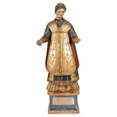 Religious sculpture in carved and polychromed wood, 19th century.