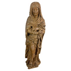 Antique Religious Sculpture of Saint in Carved Natural Wood, Late 17th Early 18th France