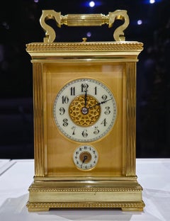 Reloj de carruaje francés en bronce dorado, siglo XIX