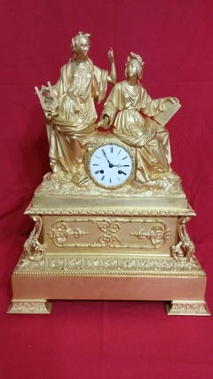 Reloj de sobremesa en bronce dorado al mercurio, siglo XIX. Época restauración.