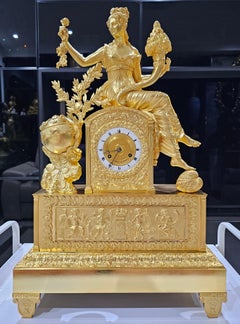 Reloj de sobremesa francés en bronce dorado, época Imperio, siglo XIX