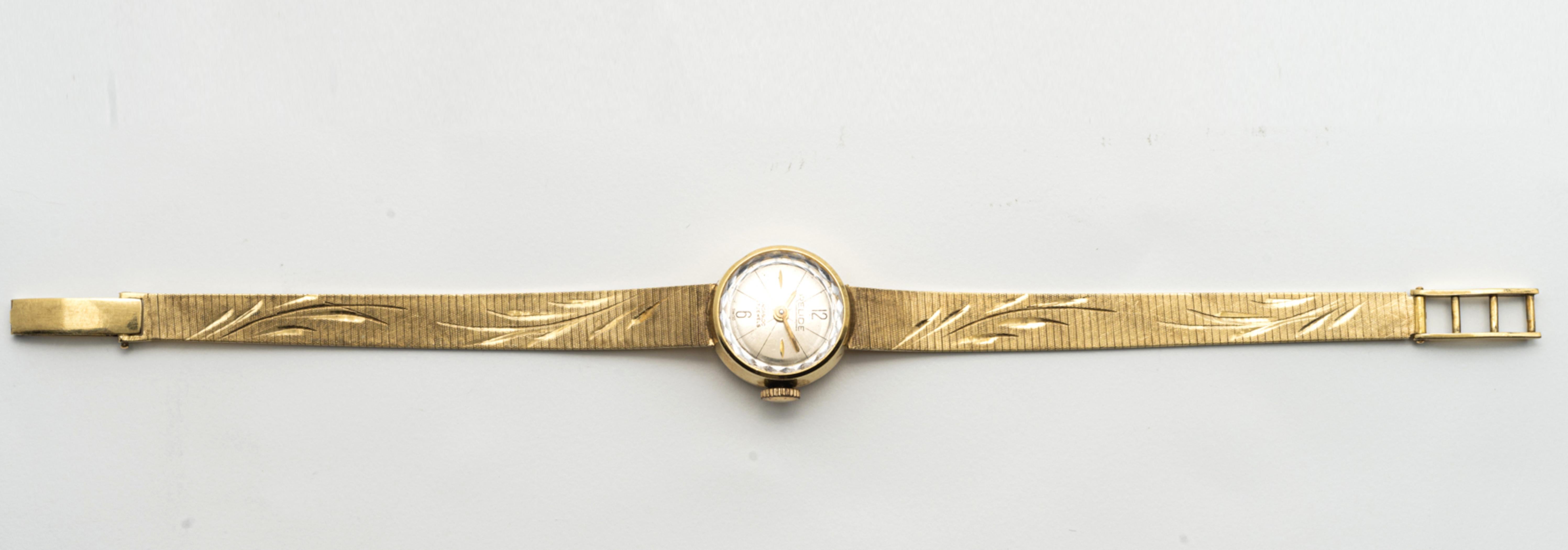 Relude
Yellow Gold Wristwatch with Bracelet
Dial: gilt
Calibre: manual winding
Case: 14k yellow gold, snap-on back
Closure: 14k yellow gold bracelet and locking clasp
Dimensions: 18 x 16 mm, bracelet length 7 in. (max.)
