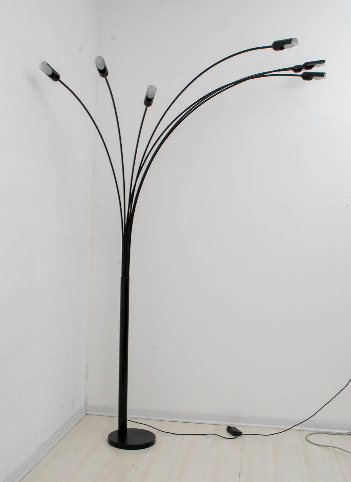 Floor lamp with seven arches of various sizes, produced in the 1970s by the Italian company Relux of Milan. The lamp has a dimmer to adjust the light density.