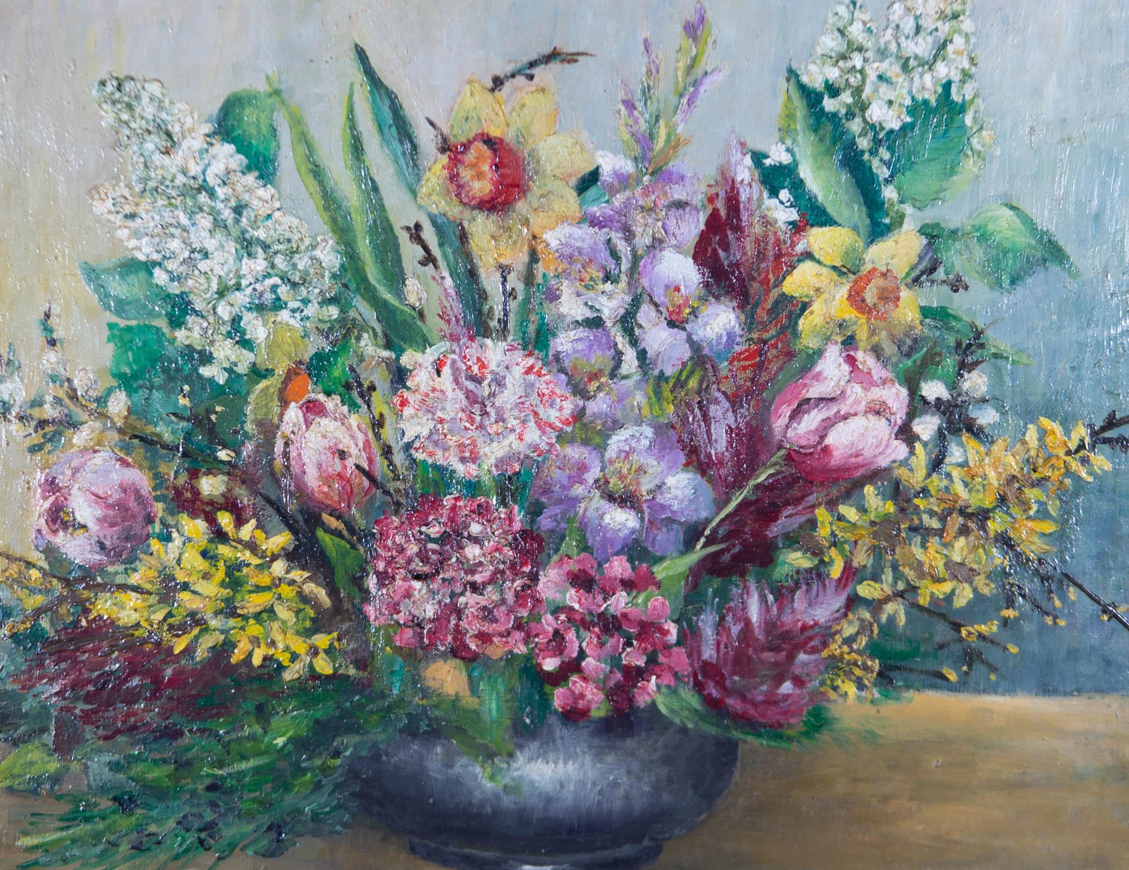 A colourful floral still life with impasto of various pink, white, and yellow flowers in a vase. Presented in an ornate gilt-effect frame. Inscribed indistinctly to the reverse. On board.
