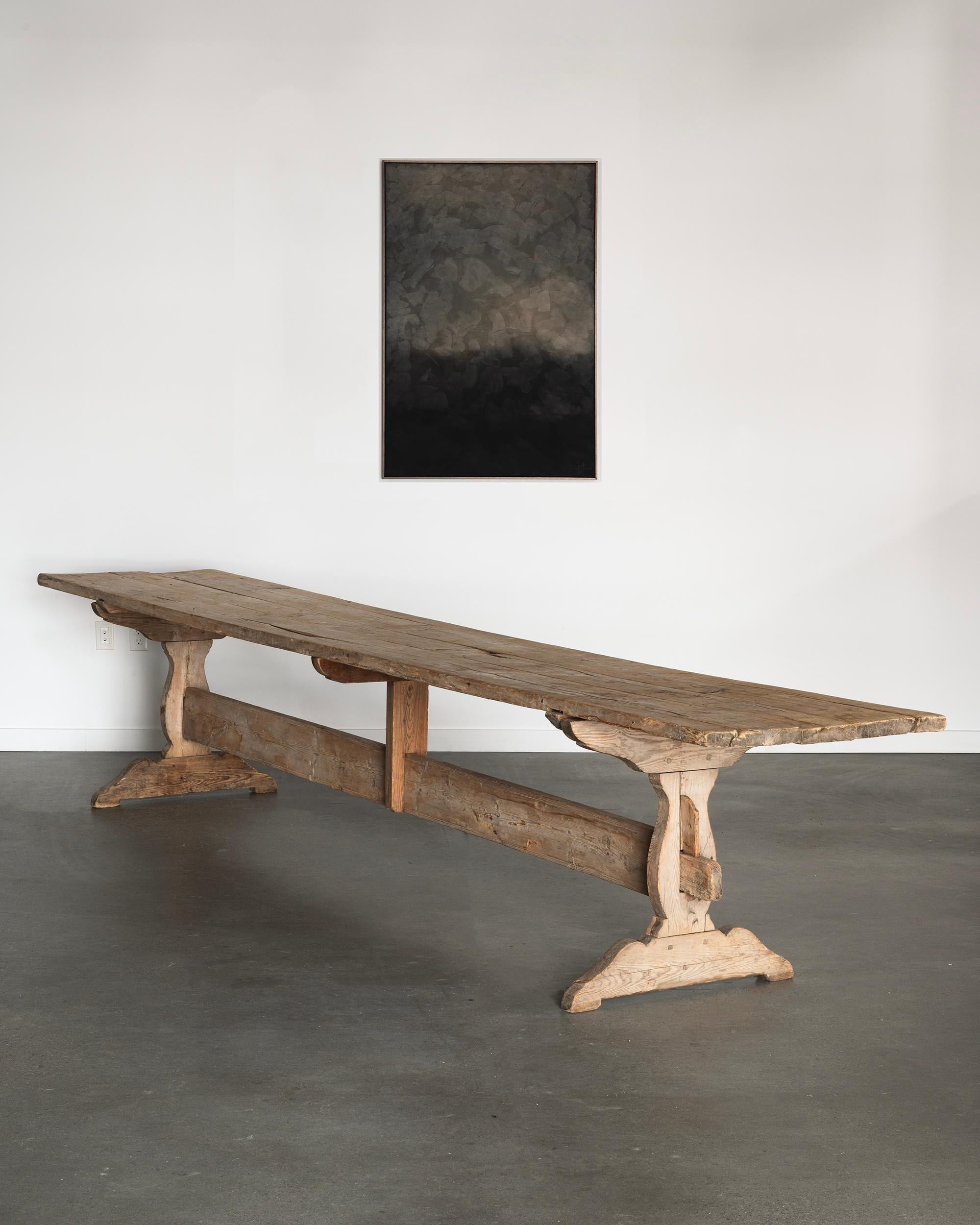 Remarkable and unusually long 18th century Swedish trestle table in it's original raw wood finish. 