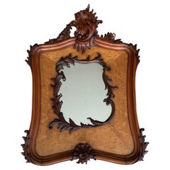 Remarkable and Richly Hand Carved Nutwood and Birdseye Maple Wooden Wall Mirror