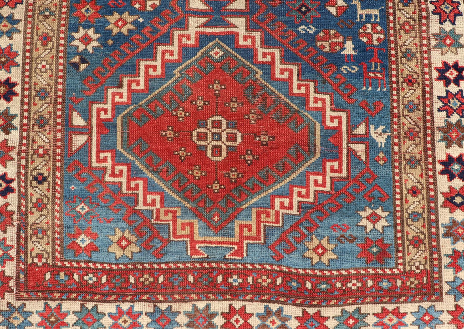 Antique Caucasian Kazak Rug in Brilliant Blue with Geometric Design Medallion's For Sale 4