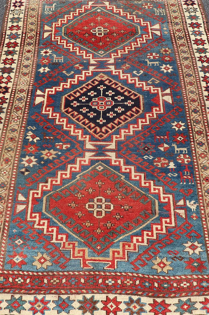 19th Century Antique Caucasian Kazak Rug in Brilliant Blue with Geometric Design Medallion's For Sale