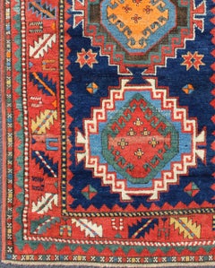 Remarkable Antique Caucasian Kazak Rug with Tribal Geometric Tri-Medallions