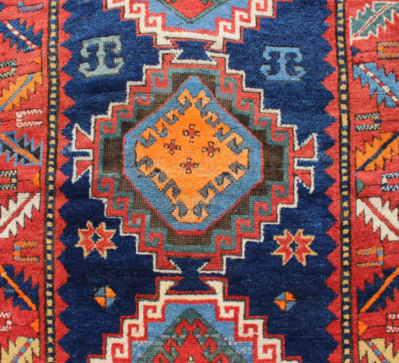 Hand-Knotted Remarkable Antique Caucasian Kazak Rug with Tribal Geometric Tri-Medallions For Sale