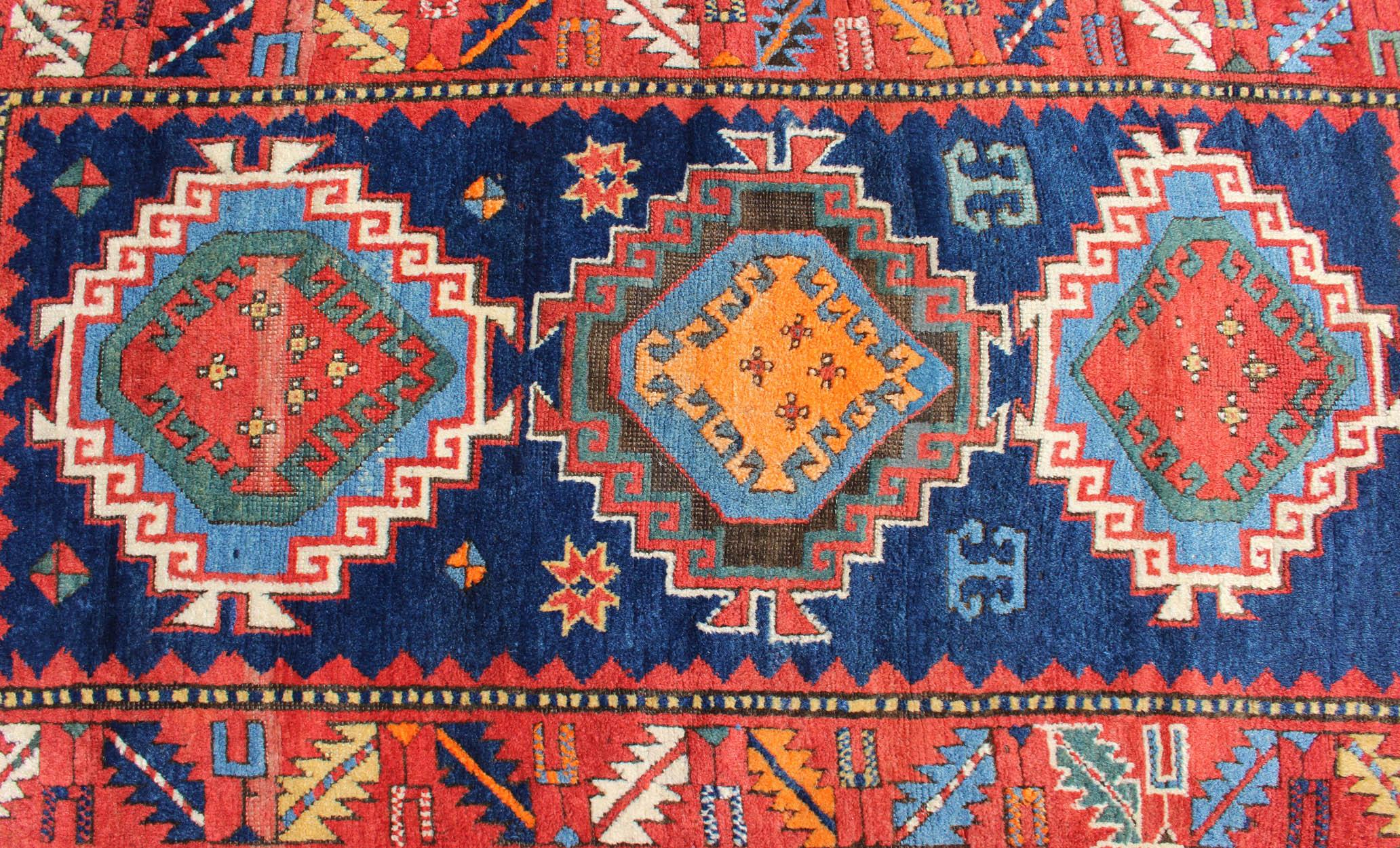 Wool Remarkable Antique Caucasian Kazak Rug with Tribal Geometric Tri-Medallions For Sale