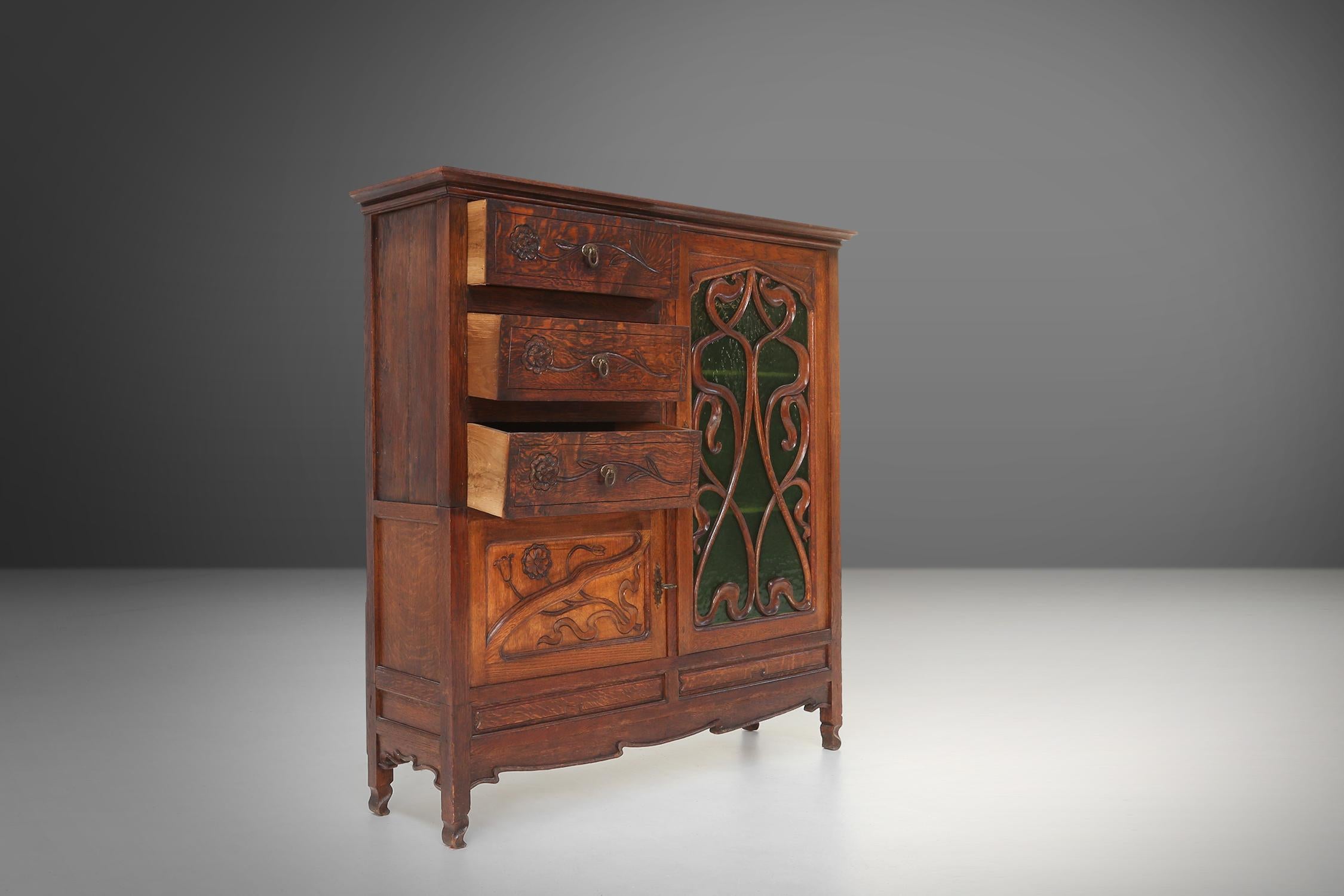 Remarkable Art Nouveau cabinet in oak with green glass door, France, 1910 For Sale 4