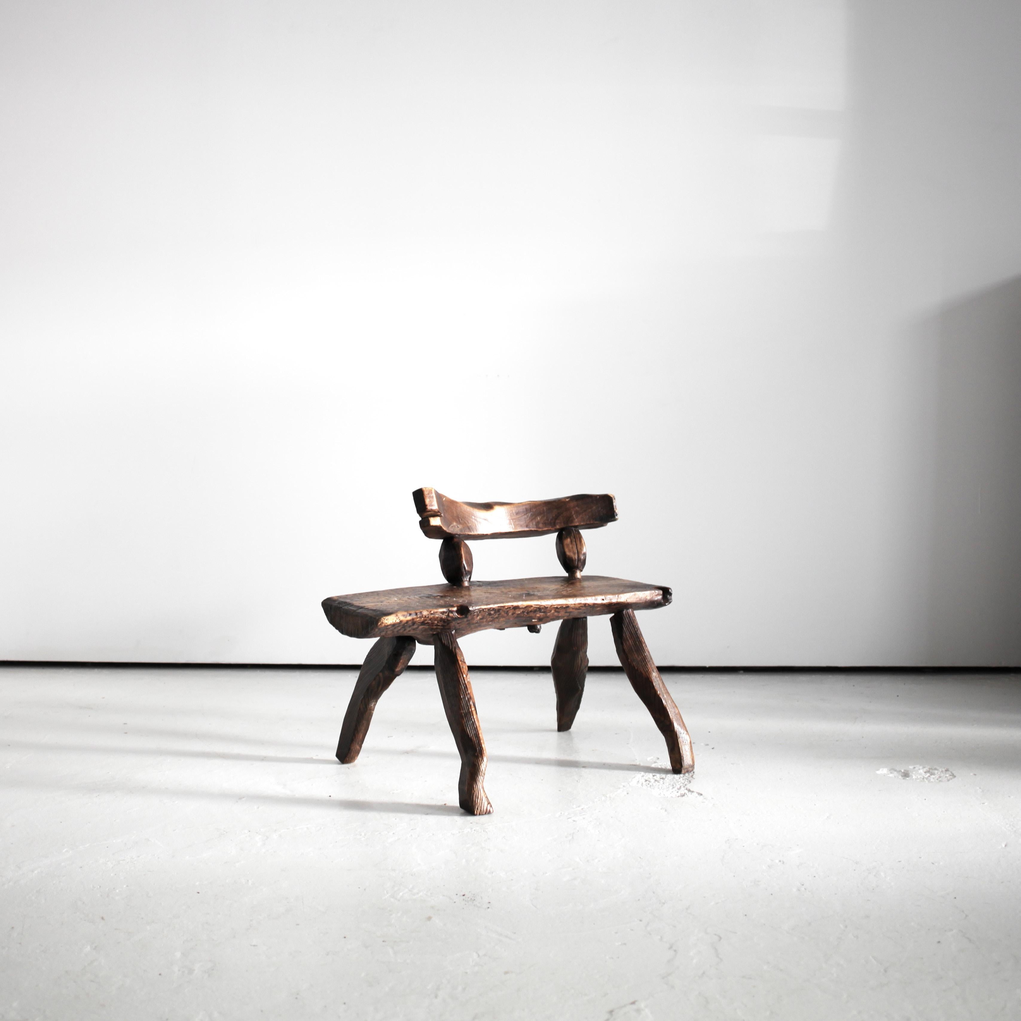 An artist made carved pine chair from Warsaw.

Distinctly carved in the Polish brutalist style.