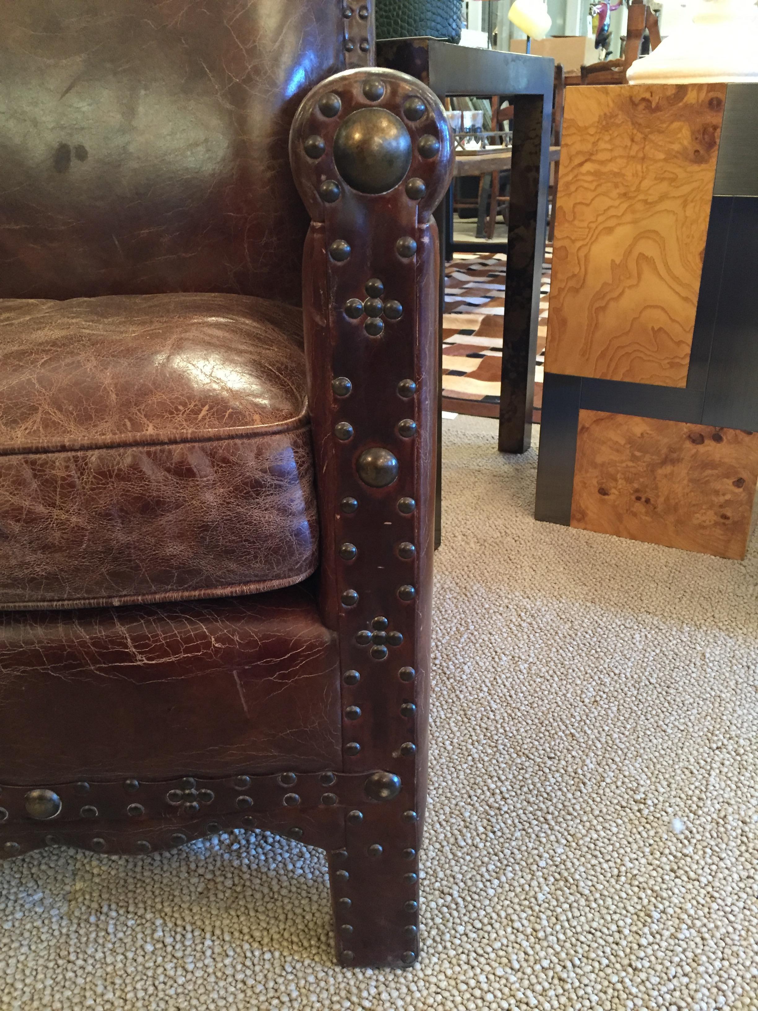 English Remarkable Distressed Leather Loveseat with French Brass Nailheads