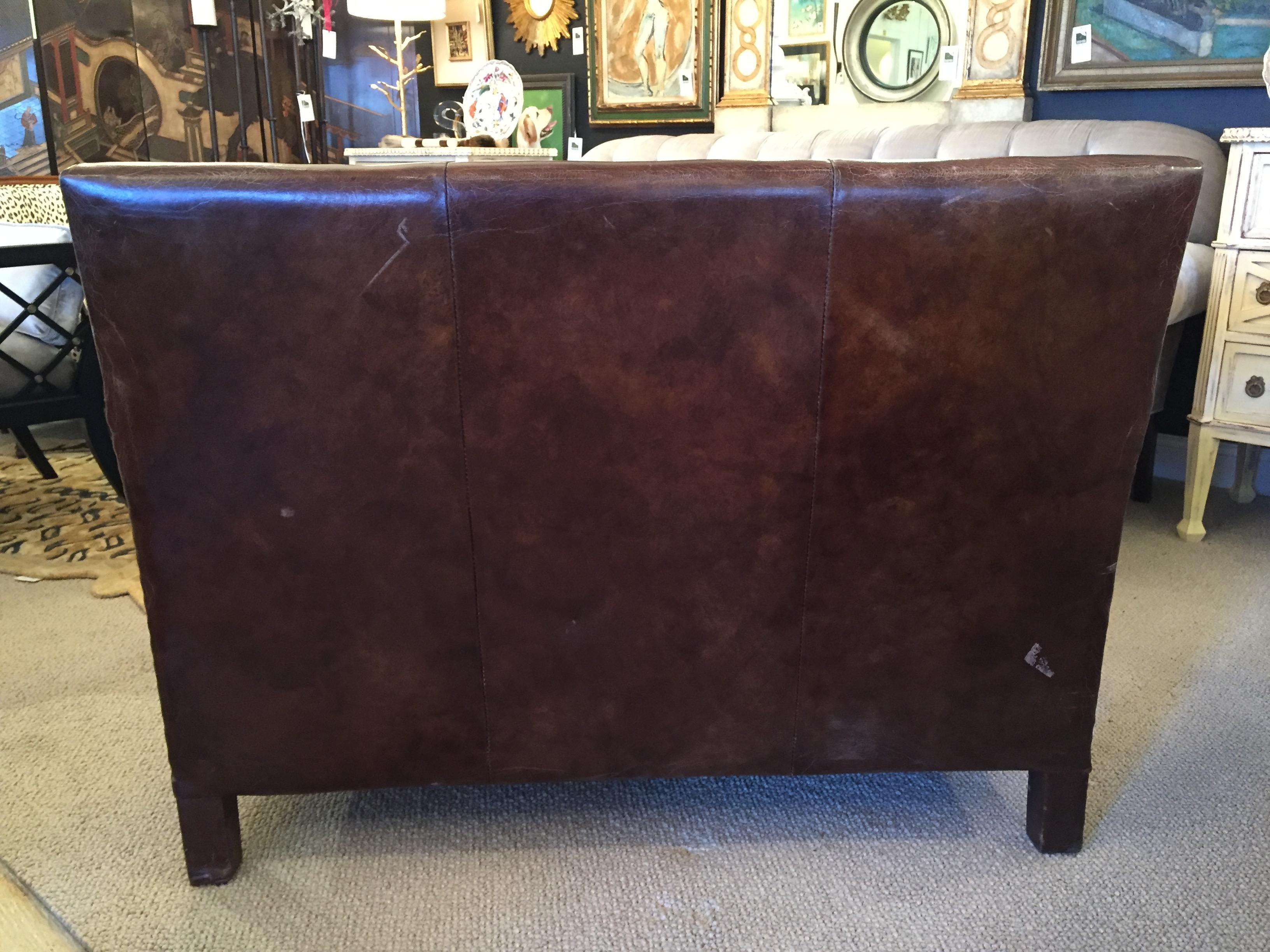 Contemporary Remarkable Distressed Leather Loveseat with French Brass Nailheads
