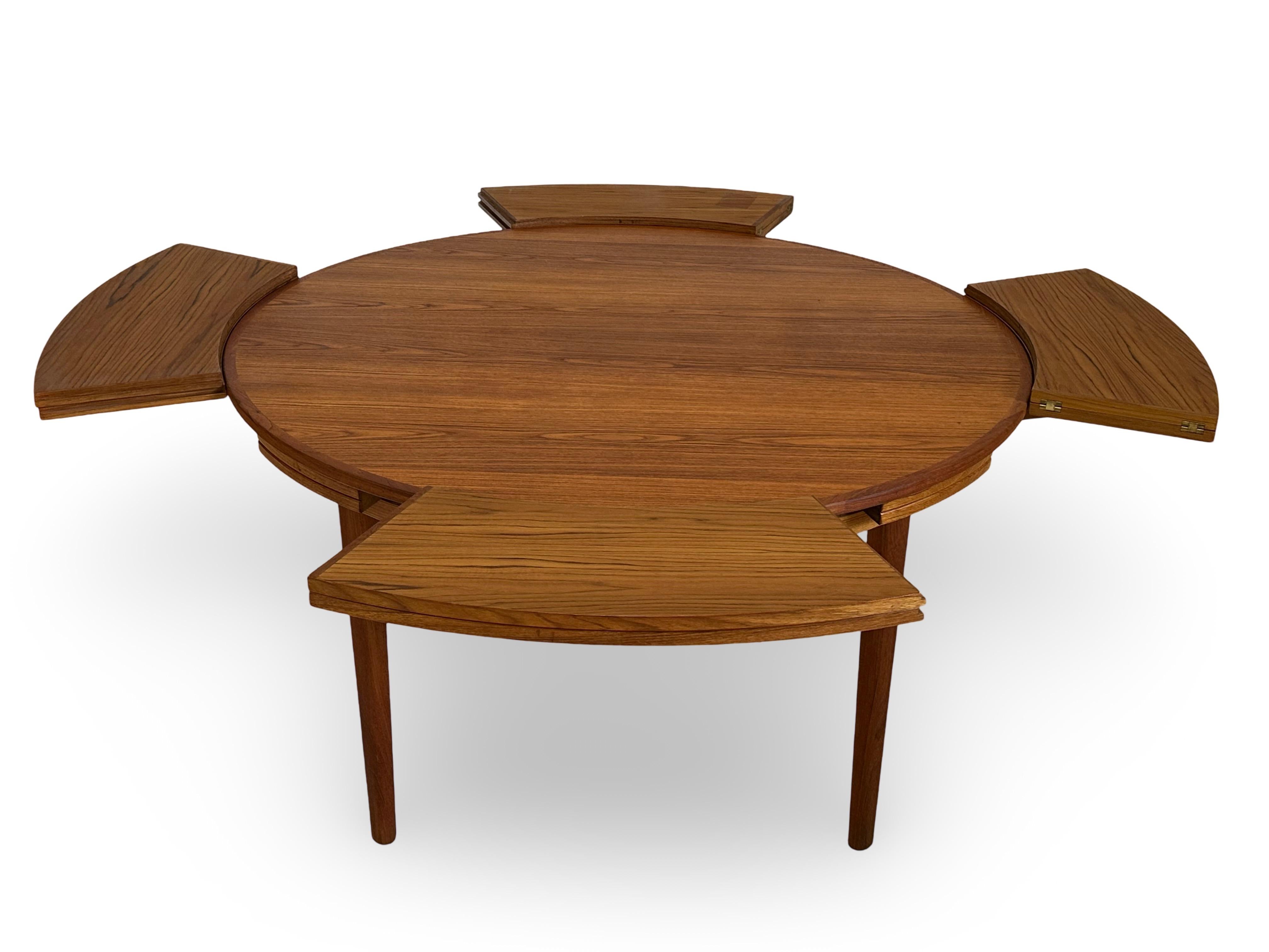Danish Remarkable extension table in teak by Dyrlund Møbler, Denmark.