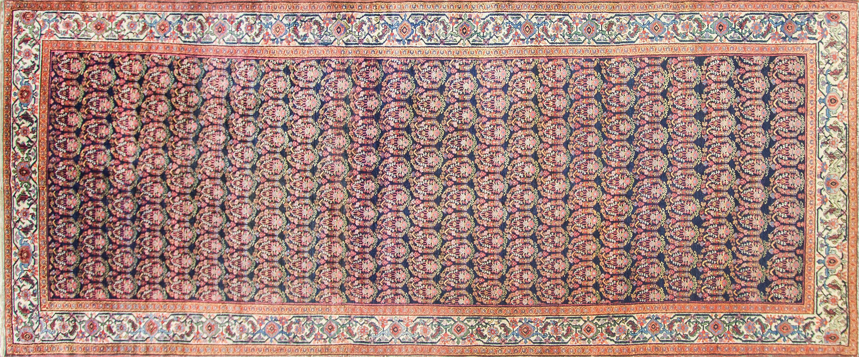Remarkable fine antique Persian Senneh Malayer galley size carpet, circa 1900 in excellent condition.
The tribal weavers in Malayer were often Turkish, and they employed the Turkish knot. The Gourde is a symmetrical knot, as opposed to the