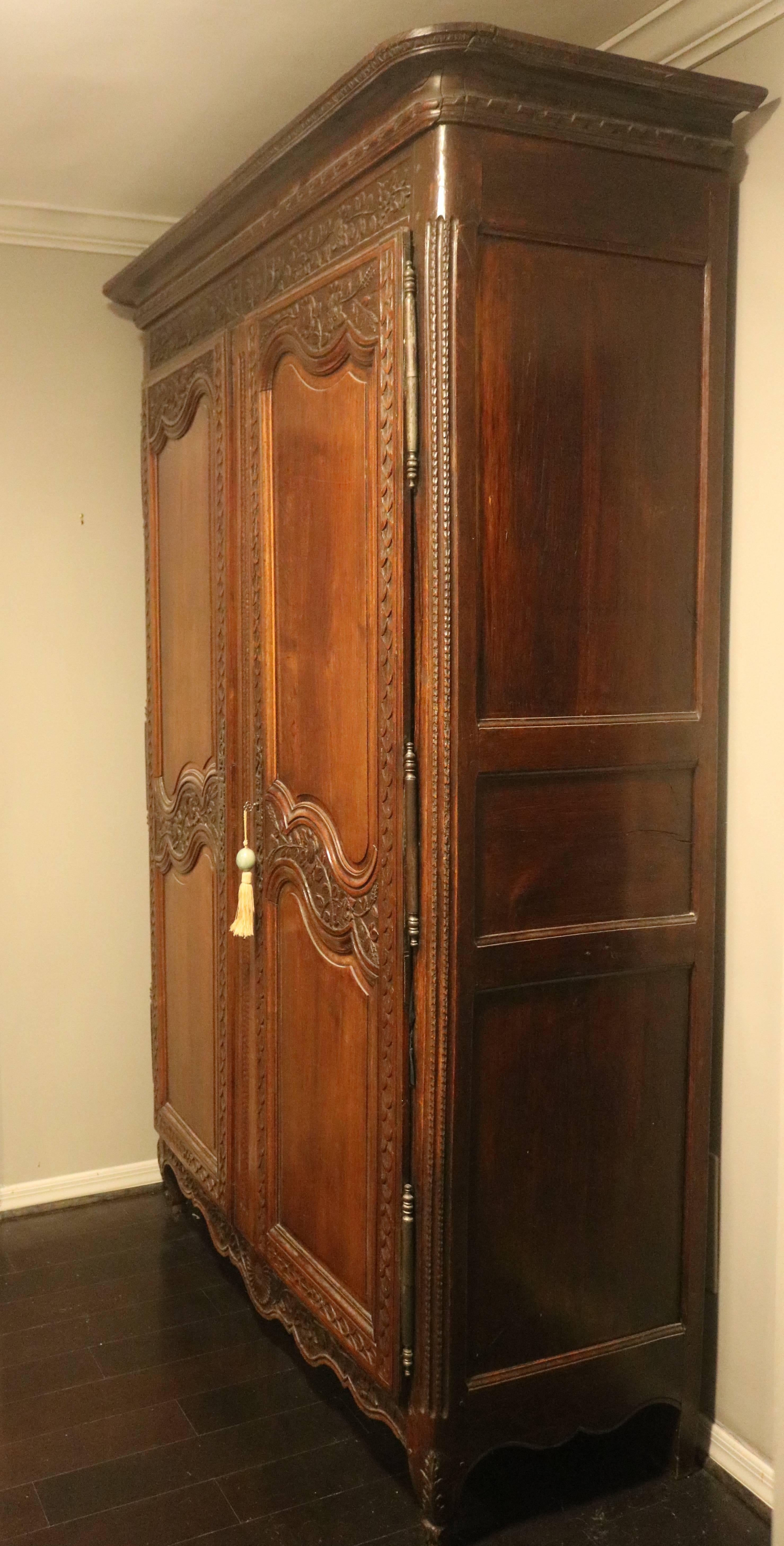 French Provincial Remarkable French Walnut 19th Century Armoire, That Is a Clothes Closet For Sale