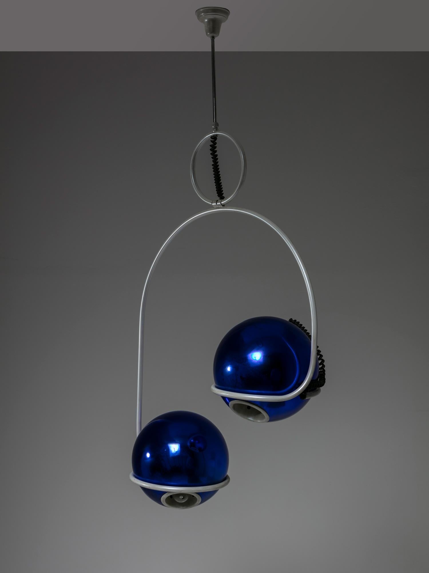 Large Italian 1970s chandelier in the style of Roberto Menghi.
Asymmetrical white lacquered frame hosts two blue mirrored glass shades.
These shades are laying on the round frame and can be freely adjustable.