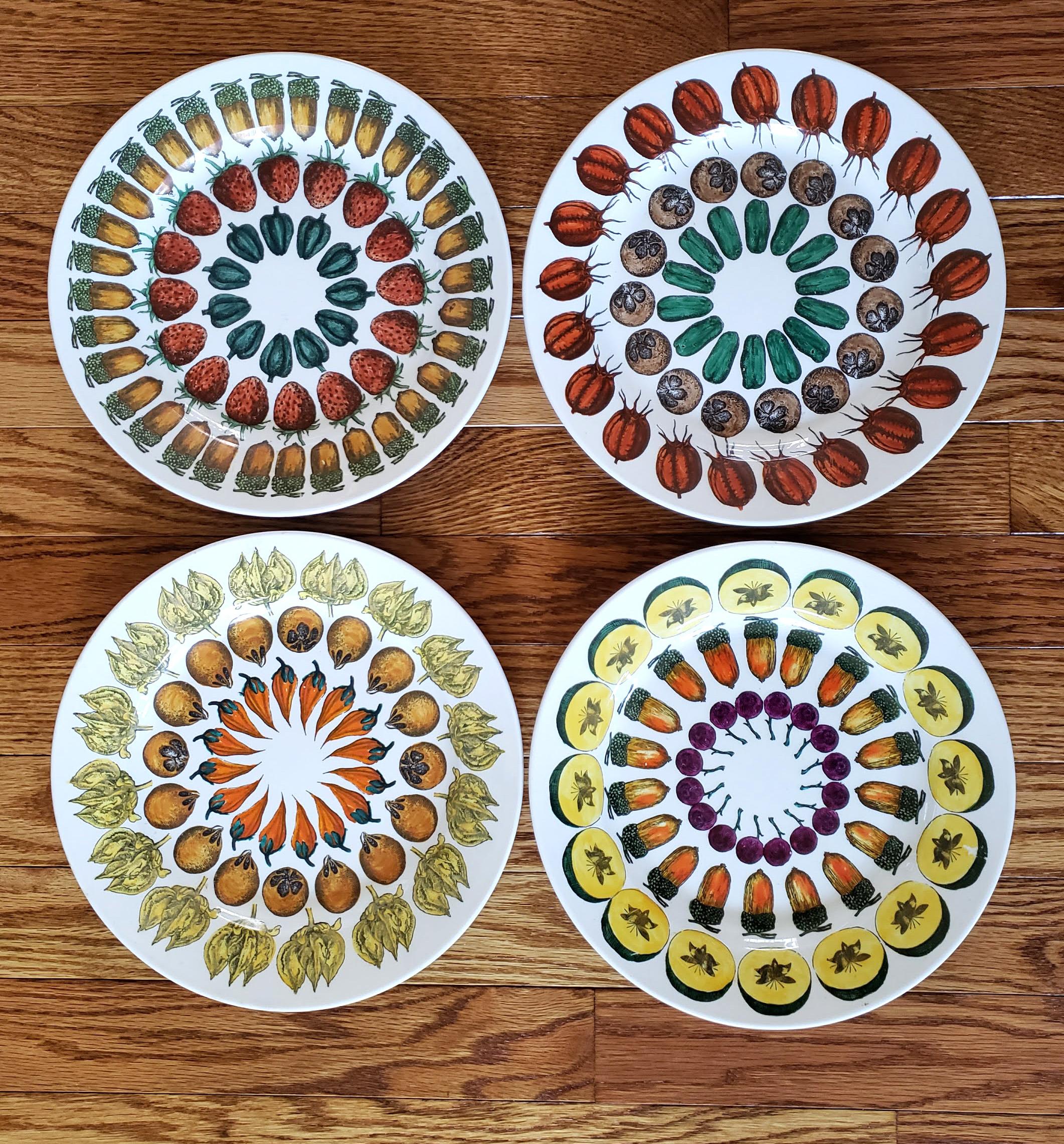 Remarkable Rare Set of Four Piero Fornasetti Giostra di Frutta Pattern Pottery Plates,
Porcelain dated 1955,
1950s.

The pattern 