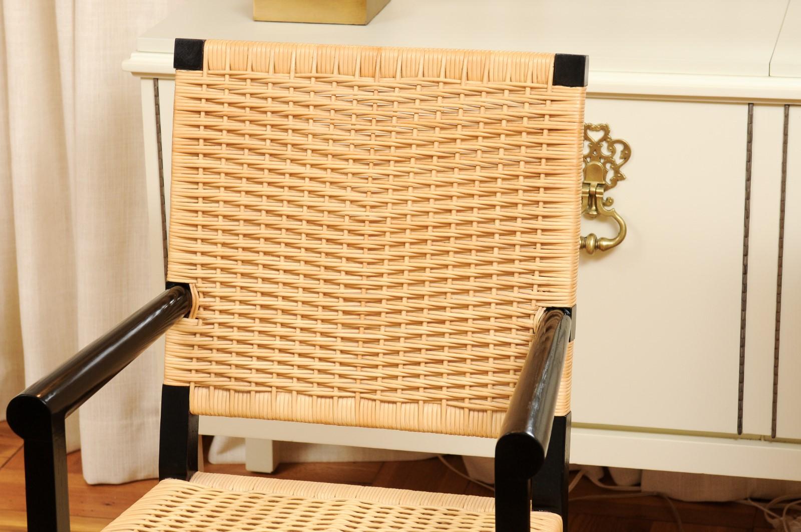 Haitian Remarkable Set of 12 Mahogany and Cane Arm Chairs by John Hutton for Donghia For Sale