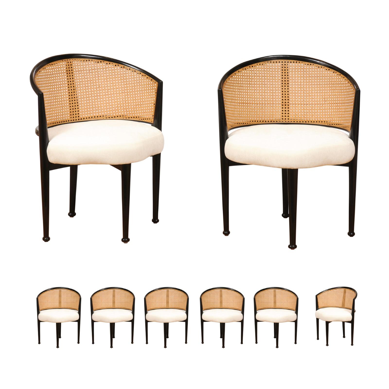 The rarest of the rare: an exceptional, meticulously restored set of eight (8) Iconic modern cane dining chairs by the esteemed Edward Wormley for Dunbar Furniture, circa 1950. Single examples from this boutique production are Impossible to source;