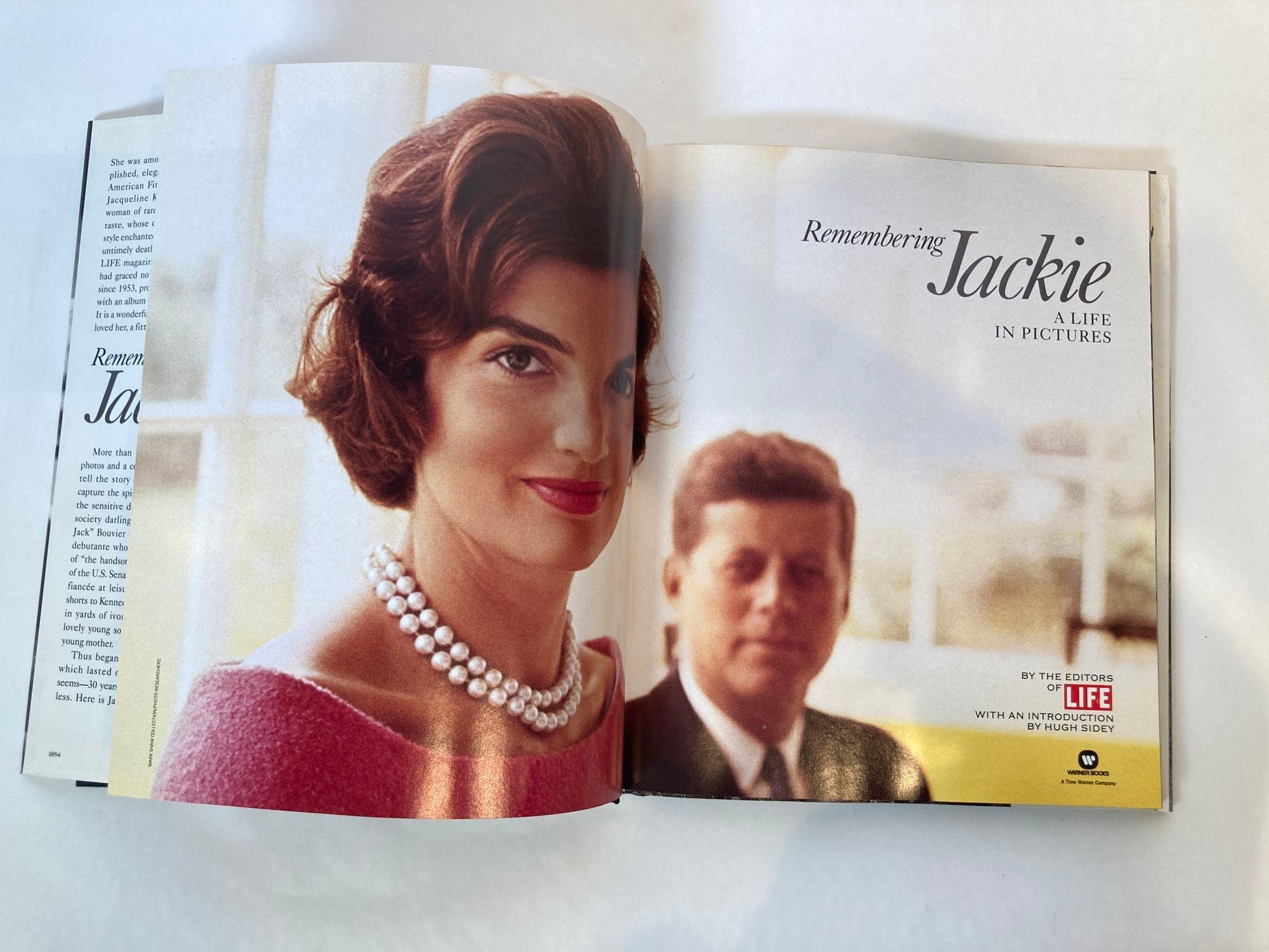 Remembering Jackie: A Life in Pictures Hardcover – January 1, 1994 by Life Magazine.
Uses photographs to trace the life of the former first lady, including her childhood, marriage, family life, White House years, and second marriage.

* Publisher