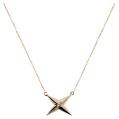 Colgante de oro y diamantes con 4 estrellas Mega