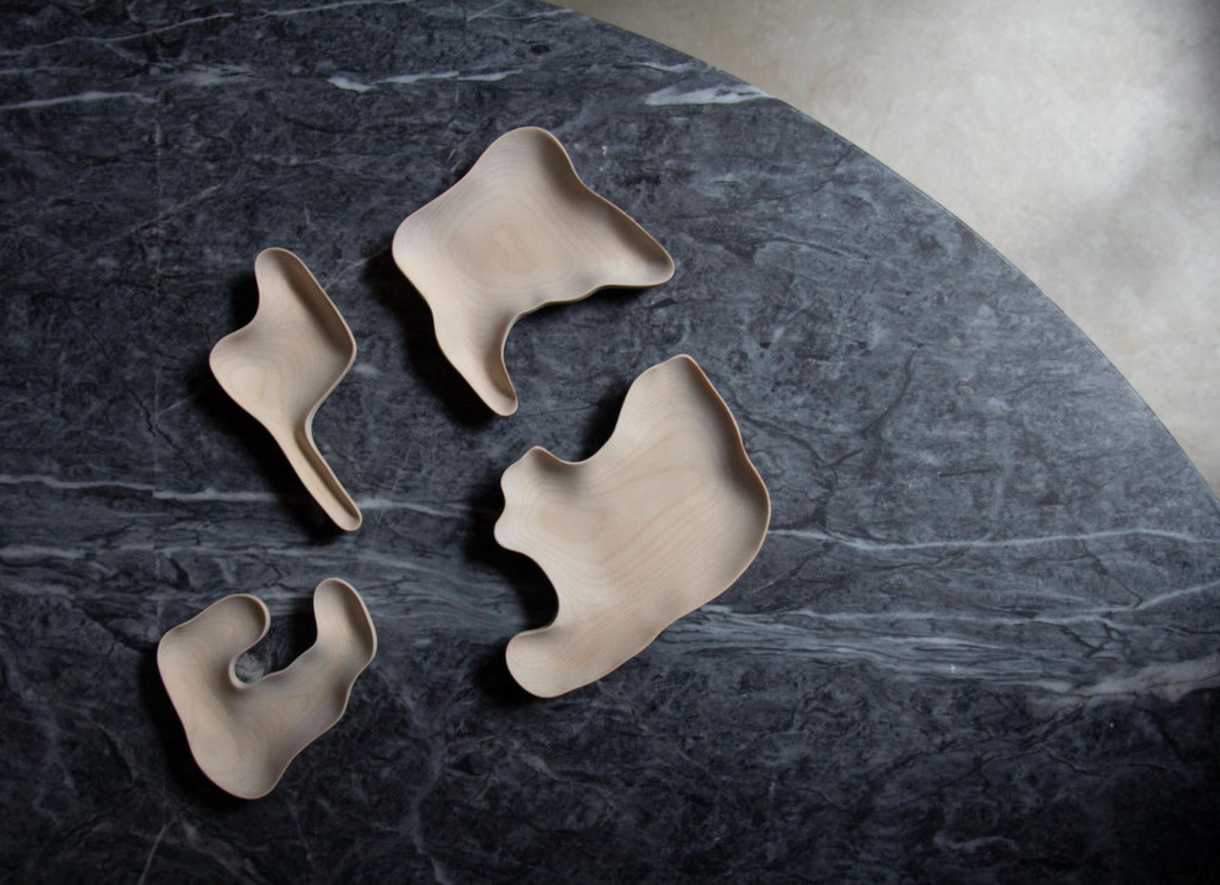 Remissus vide-poche by Vilde Hagelund
Current Production
Dimensions: W 12 x D 12 x H 1.5 cm
Materials: Birch wood.

Remissus is inspired by the water drop and its unpredictability in the contour. The various shapes leave traces of the