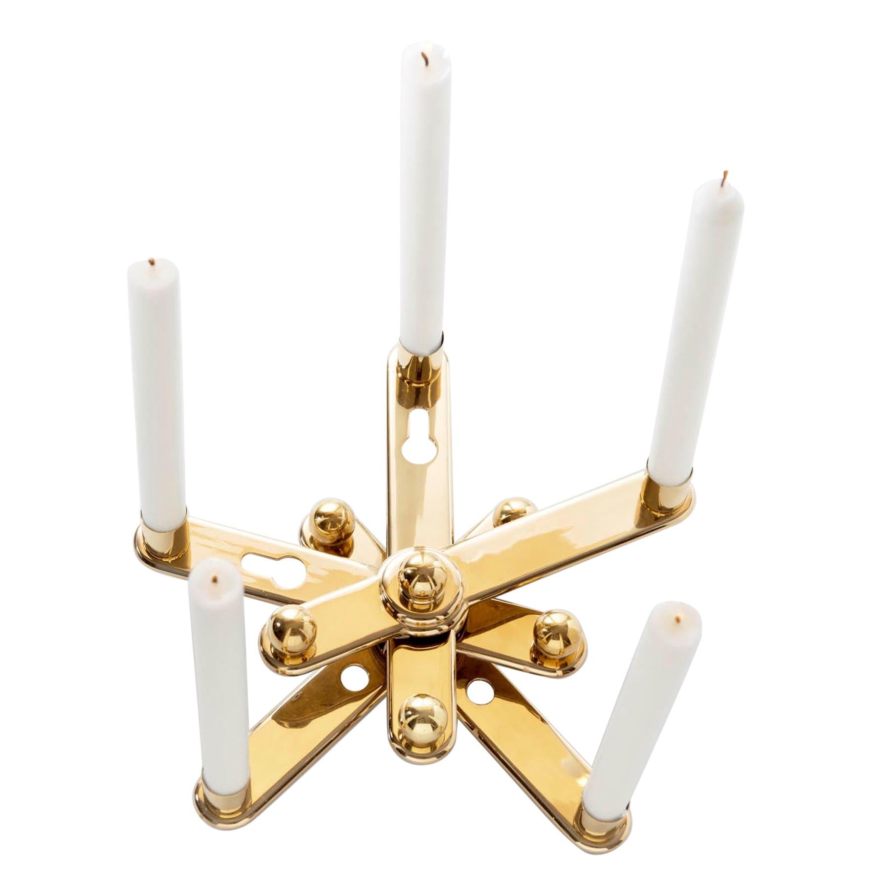 Candleholder in solid brass made out from recycled door handles. Edition of 75 For Sale
