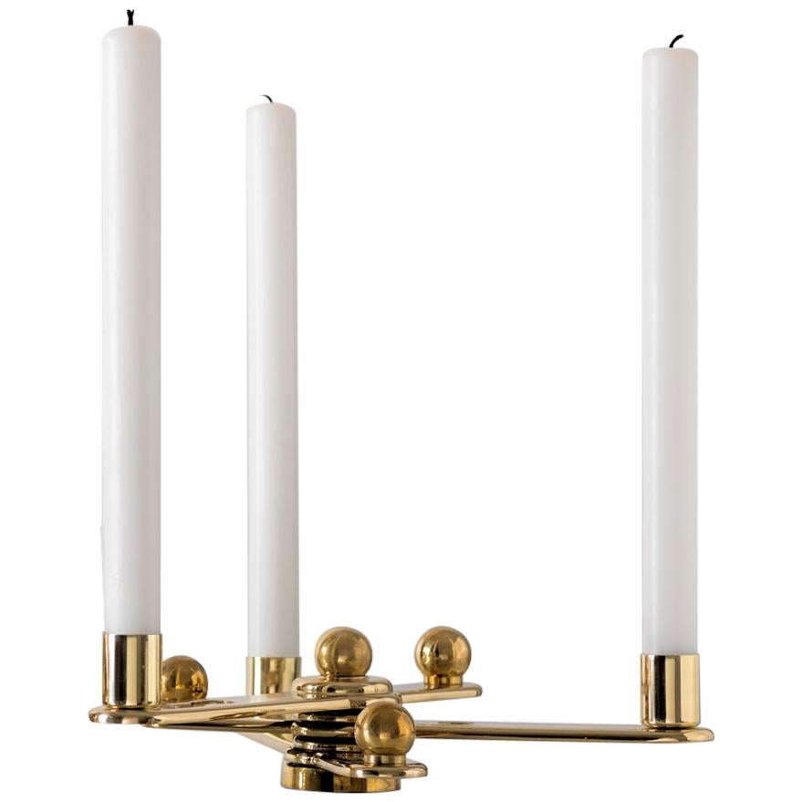 Candleholder in solid brass made out from recycled door handles. Edition of 225 For Sale