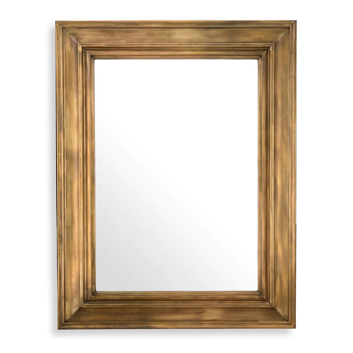 Mirror Remona Large with stainless steel and iron
frame in vintage brass finish, with clear mirror glass.
