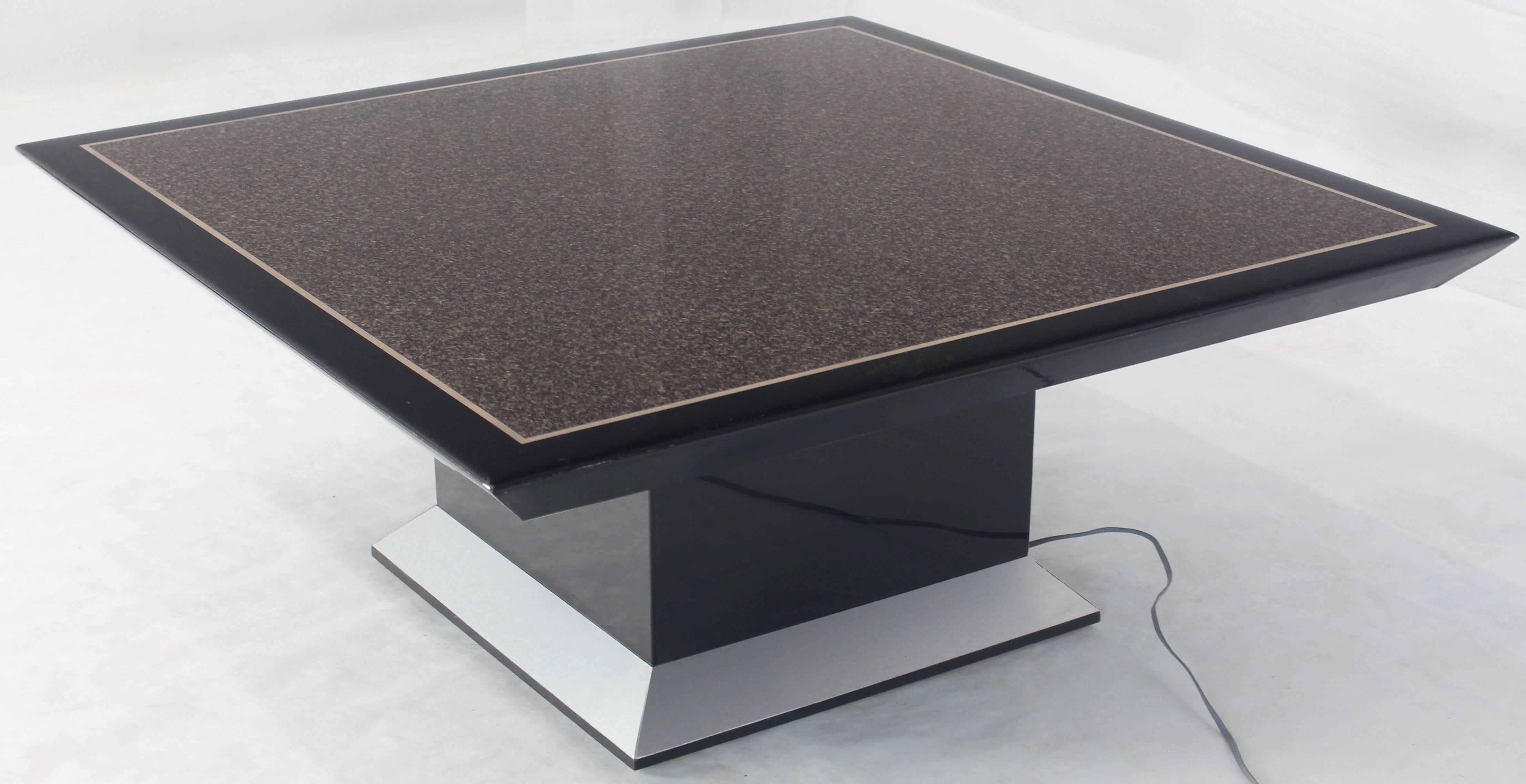 Square adjustable height faux granite finish dining coffee or game table. Unique custom built design adjustable height table with a remote control. Beautiful black lacquer finish.