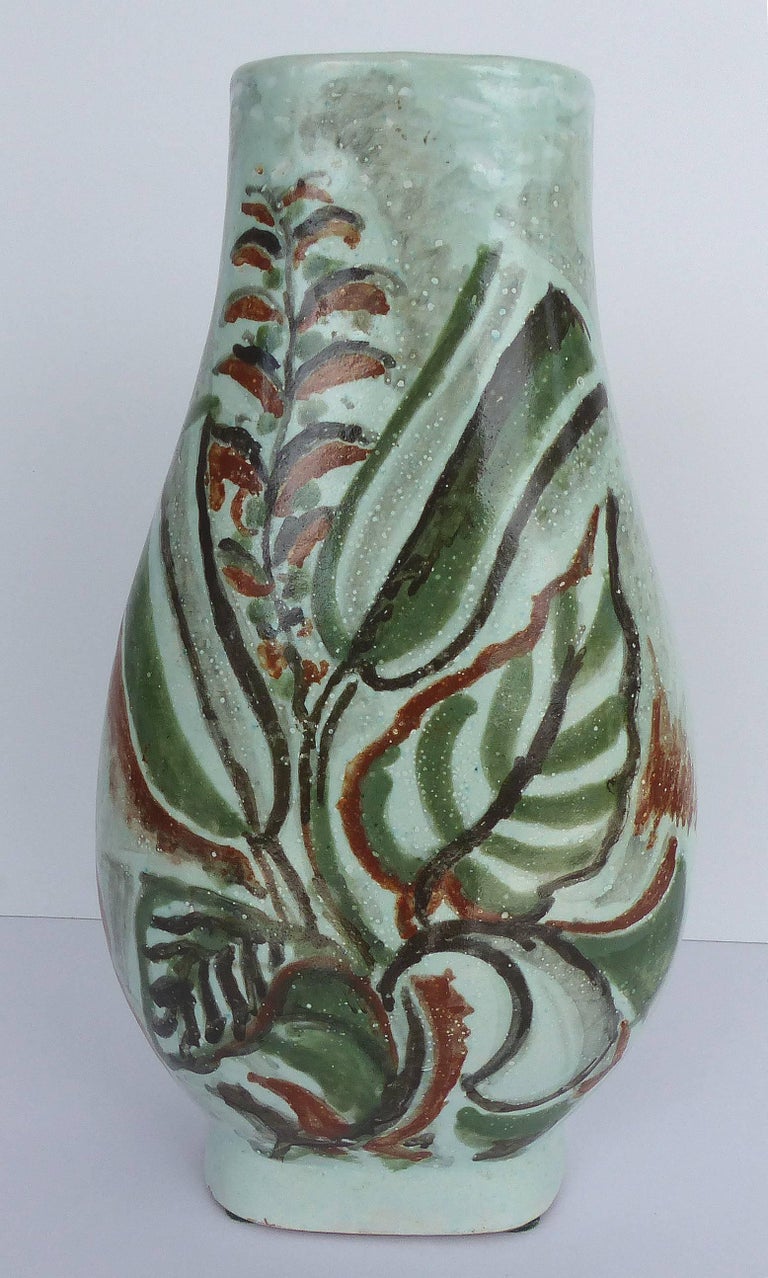 René Buthaud, ceramic vase of woman with fan, circa 1920s

Offered for sale is a hand painted original René Buthaud glazed ceramic vase depicting a woman with a fan. Signed with initials on the underside. René Buthaud was seen as the most