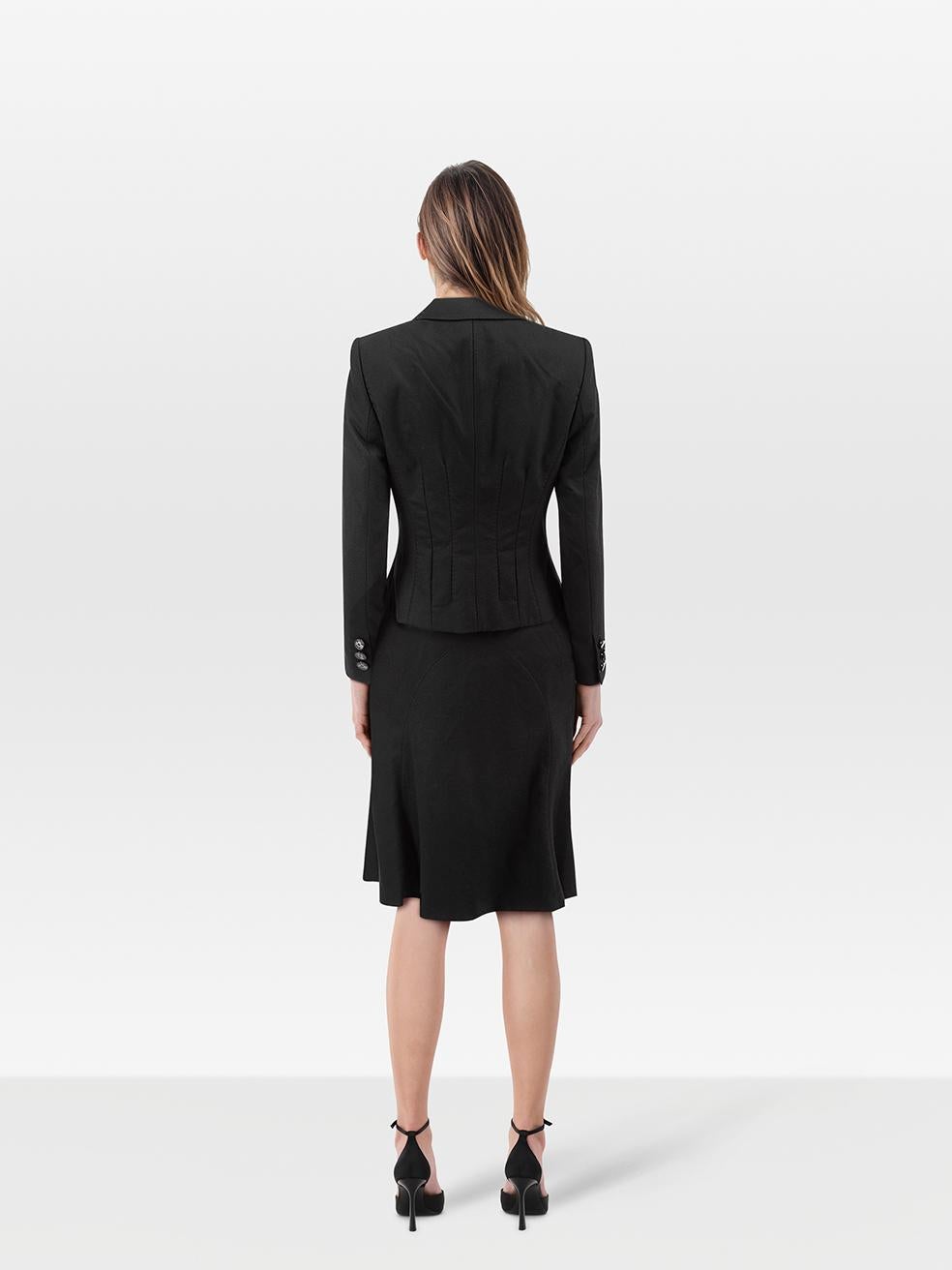 CONDITION is Very good. Minimal wear to the matching set is evident. Marks on the front of the skirt and inside lining on this used Rena Lange designer resale item.
 
 
 
 Details
 
 
 Black
 
 Wool
 
 Blazer and skirt set
 
 Single breasted blazer
