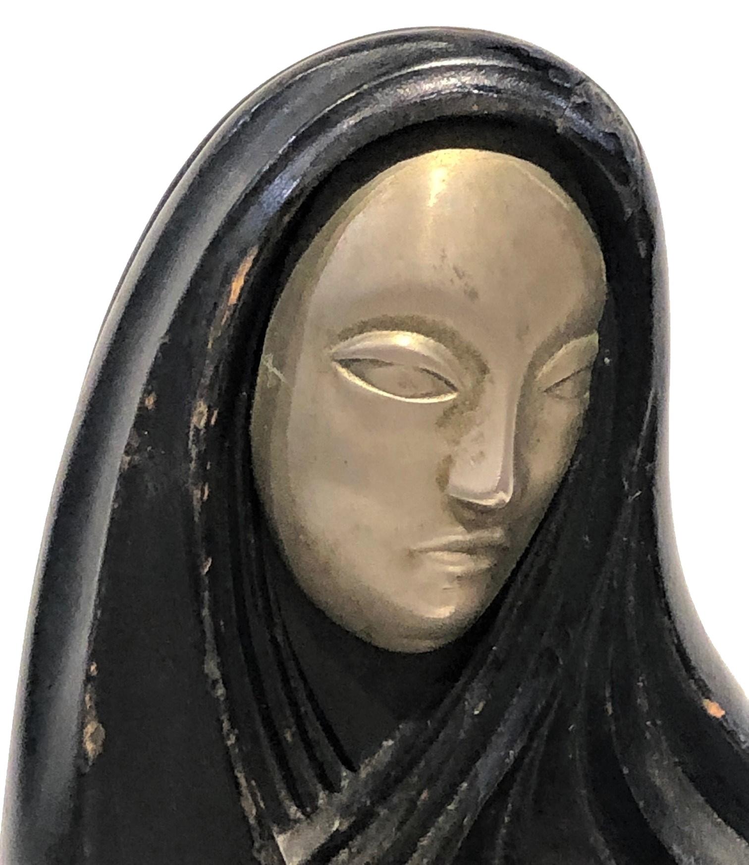 Austrian Art Deco 
(for Rena Rosenthal  possibly, by Hagenauer)
Madonna and Child
Carved Ebonized Wood & Silvered Metal 
ca. 1920’s

MATERIALS
Ebonized wood and silvered metal.

MARKINGS
Stamped with “Made in Austria” and 