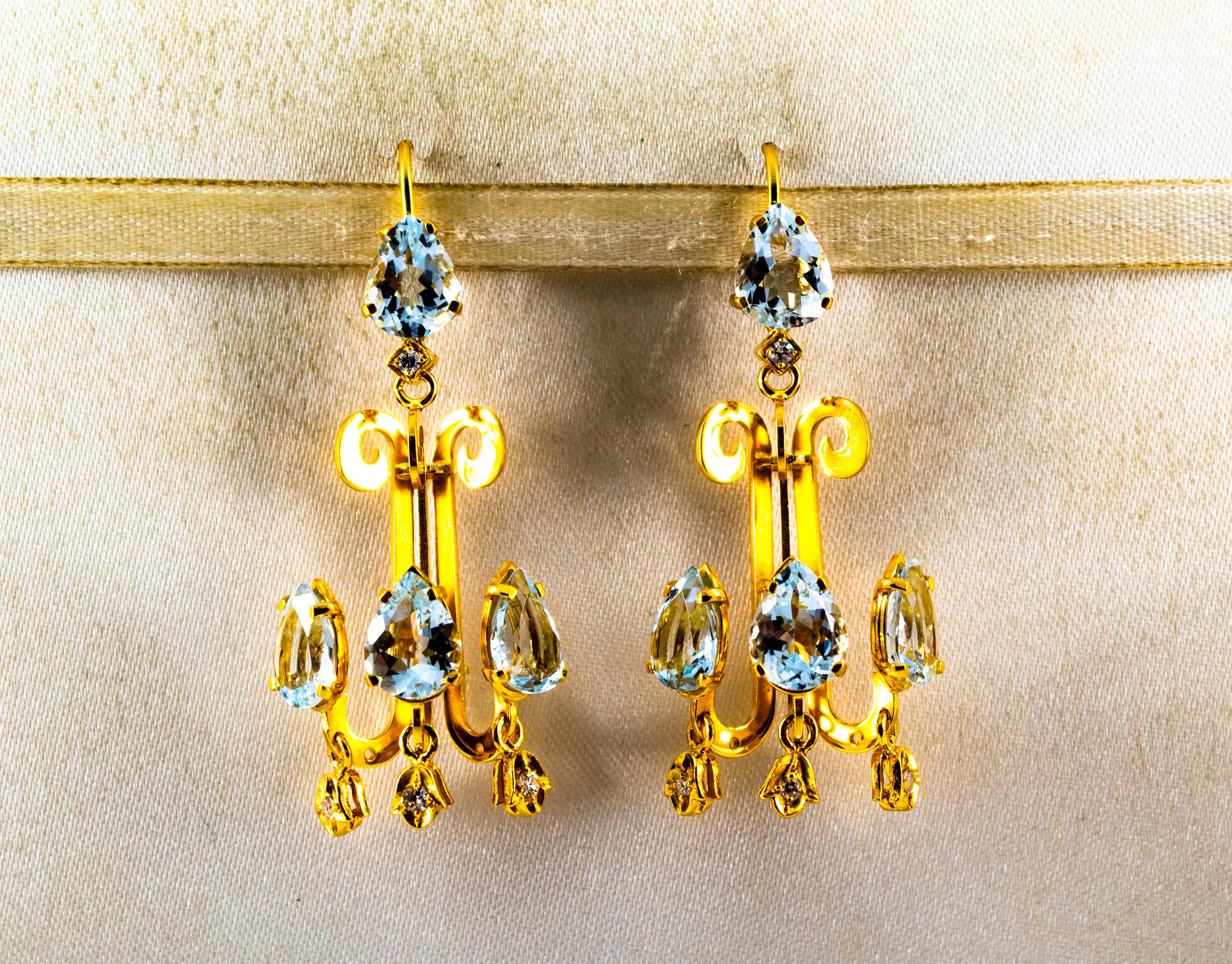 These Stud Earrings are made of 14K Yellow Gold.
These Earrings have 0.16 Carats of White Modern Round Cut Diamonds.
These Earrings have also 10.20 Carats of Aquamarines.
These Earrings are available also with Emeralds.
All our Earrings have pins