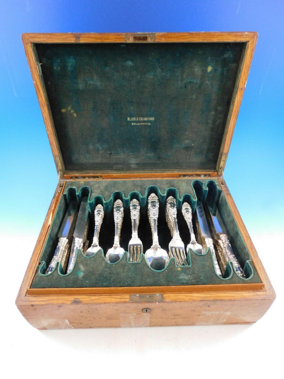 Exceptional Renaissance by Dominick and Haff flatware set, 84 pieces. This scarce figural pattern features a Renaissance Man's face on the handle and on the back of the soon bowl - in fine detail. This set includes:

12 Dinner Size Knives, 9