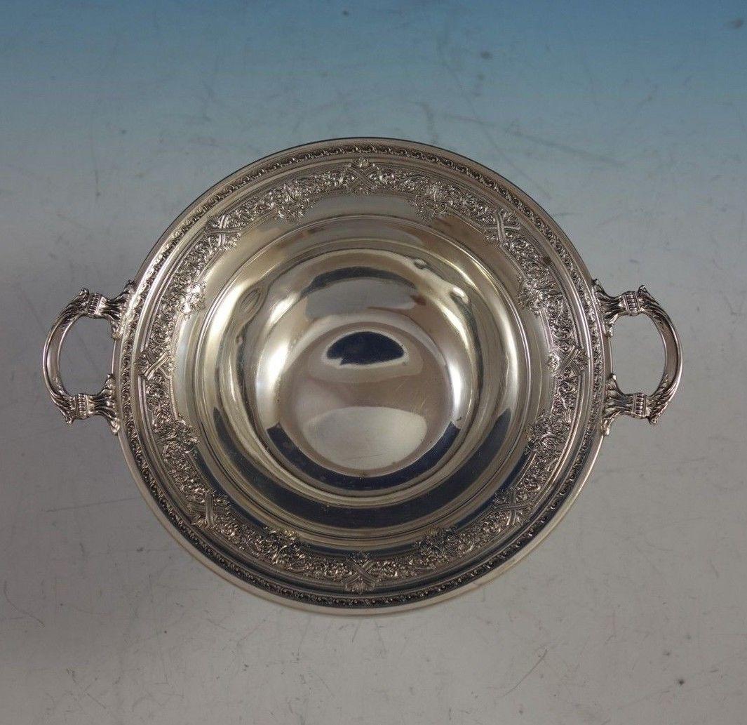 Lovely Renaissance by International sterling silver candy dish with handles. The piece is marked #B41A.
The bowl measures 1 3/4 tall x 6 in diameter, and with the handles it measures 8 wide. It weighs 5.26 troy ounces.
It is not monogrammed and is