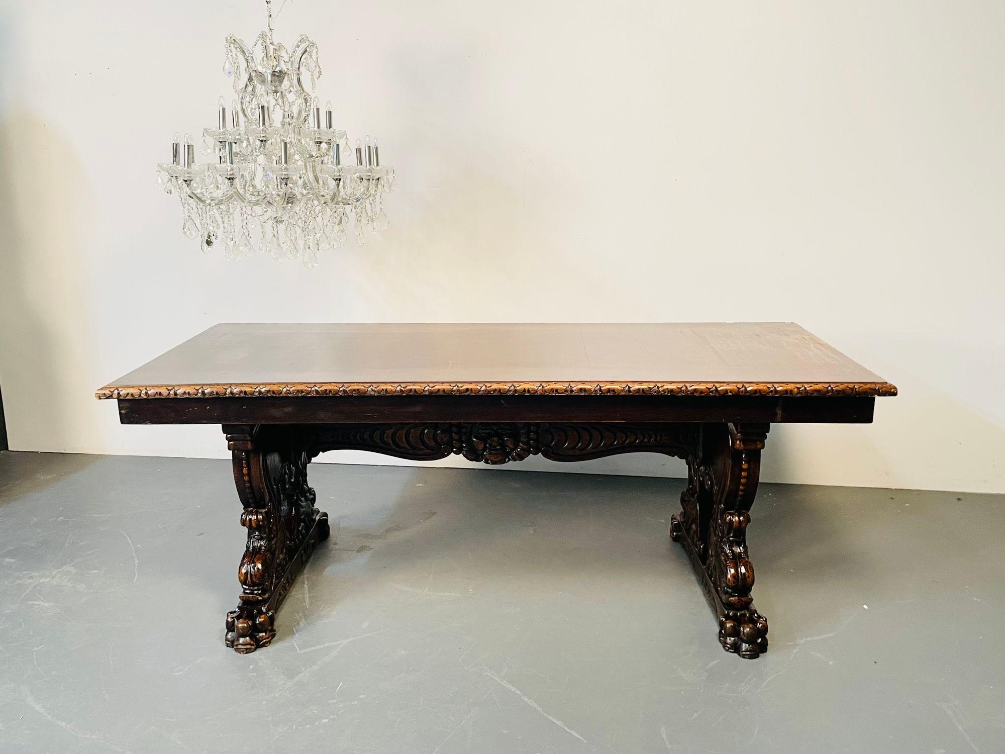 Renaissance Carved Dining, Center Table, Dolphin Claw Foot Base, 19th Century
A finely carved Renaissance Revival Heavily carved dining, center or library table. The scalloped edge table top while in need of restoration, still stunning sits atop a