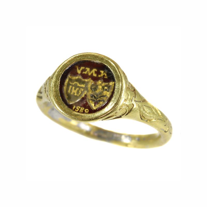 There's a depth to this 18K yellow gold Renaissance ring as it must have gone to astonishing lengths to make it from the year 1580 to our present time.
The identity of the initial owner is fused into four engravings embedded in red enamel in the top