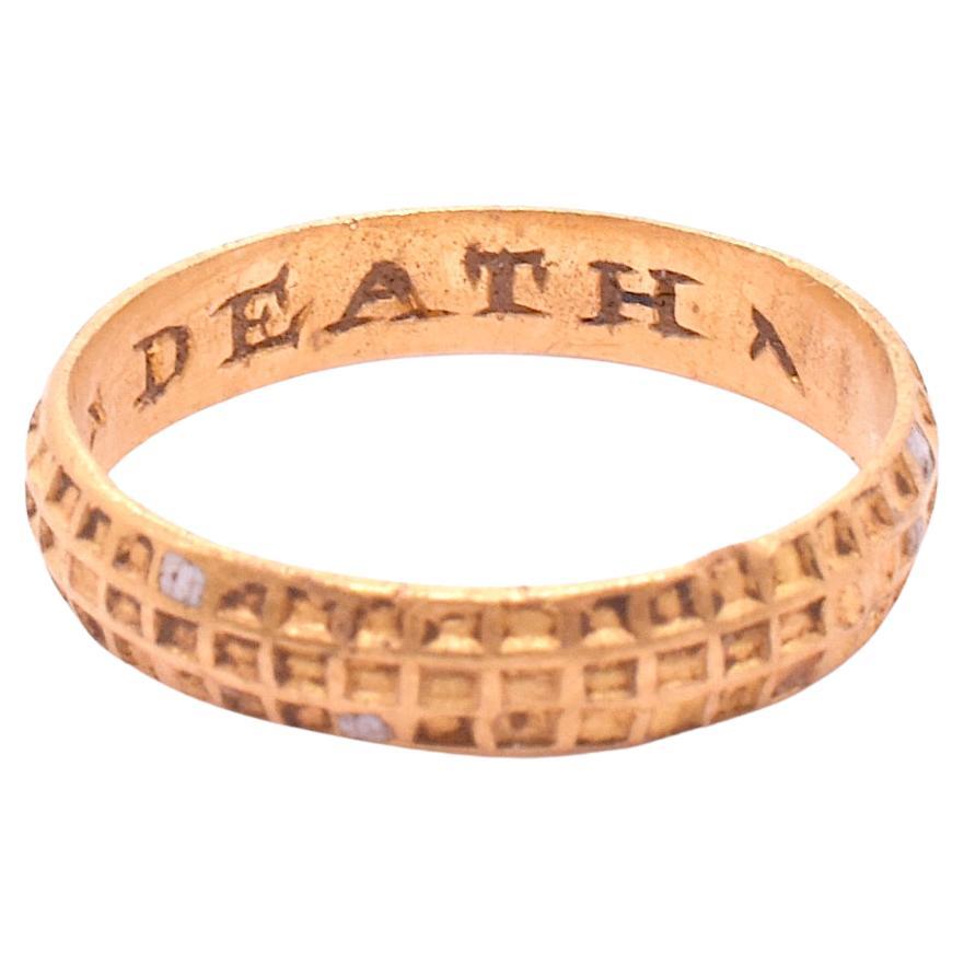A renaissance era poesy ring (spelled posy, posie, or posey), the outer ring of our posy has a chequerboard pattern with the darkly romantic inscription 