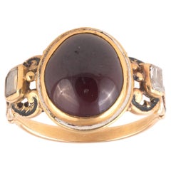 Anillo renacentista de granate y diamantes talla tabla