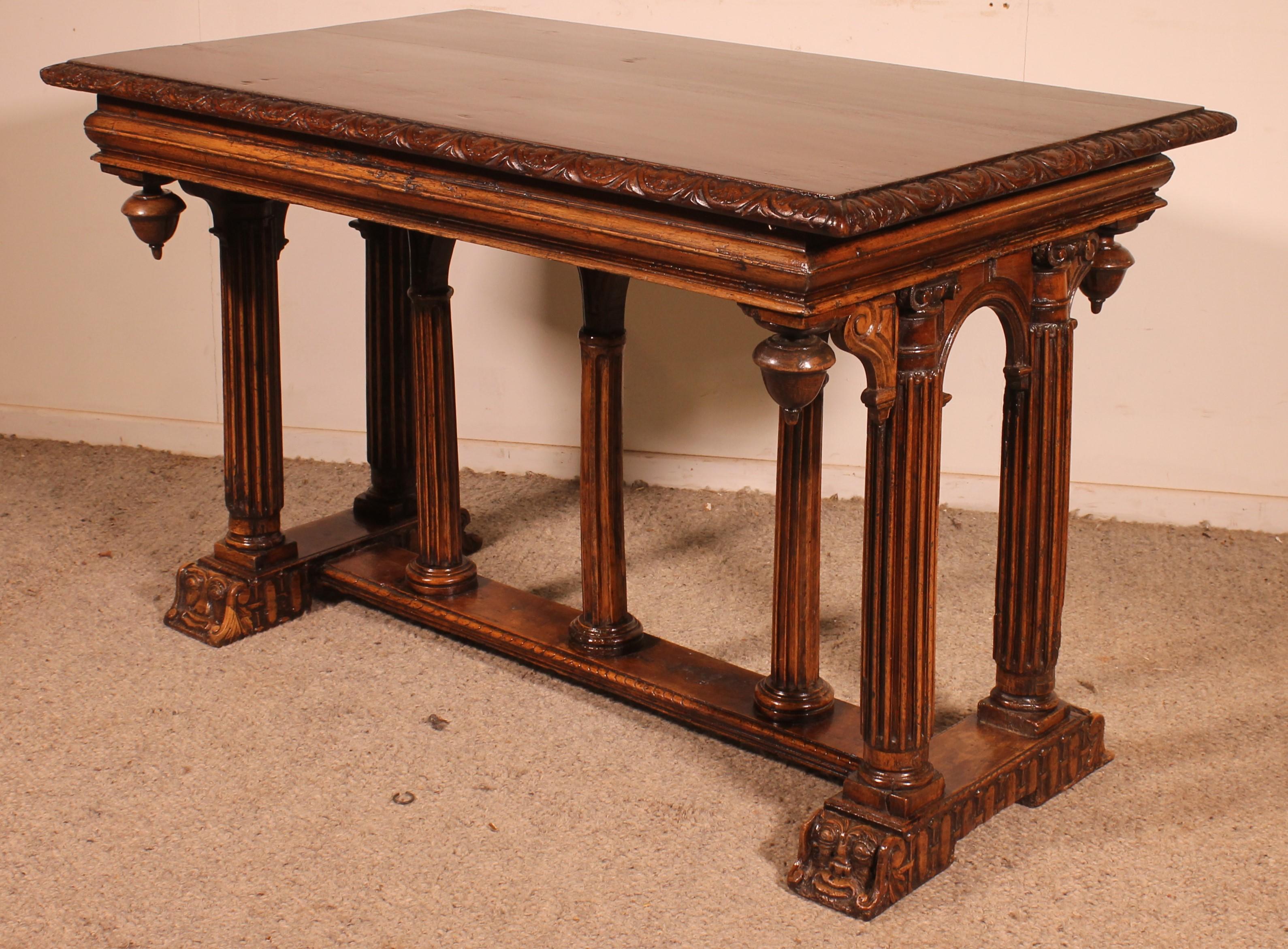 superb rare Renaissance period table in walnut from France from the 16th century

Very beautiful table that can be used as a presentation table or desk since it has a height below the belt of 64cm.

Very beautiful top with its carved frieze. The