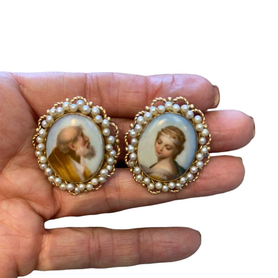 Gorgeous styled earrings are decorated with ornate gold framing and seed pearls, set with omega backs for pierced ears. (Can be made into clip on-only earrings)
Circa 1900's
The cameos have stunning detail and are in pristine condition; soft colors