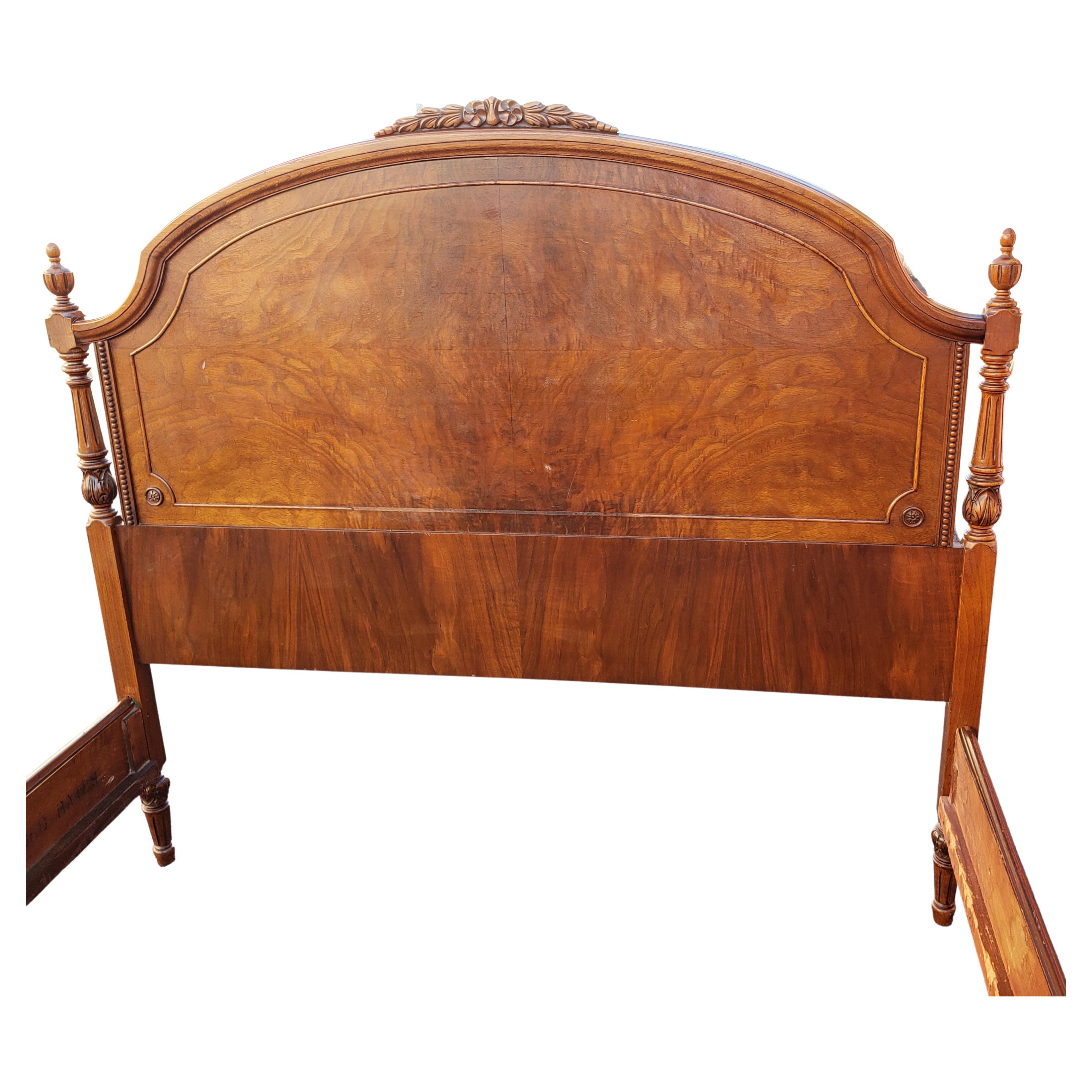 This is a full size vintage renaissance French bed. Circa 1920s by the famous Phenix Furniture of Warren, Pennsylvania. Intricate carvings on walnut and walnut burl veneers. An amazing combination of perennial style, elegance. A true representation
