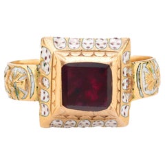 Renaissance revival garnet 14k yellow gold and white enamel solitaire ring