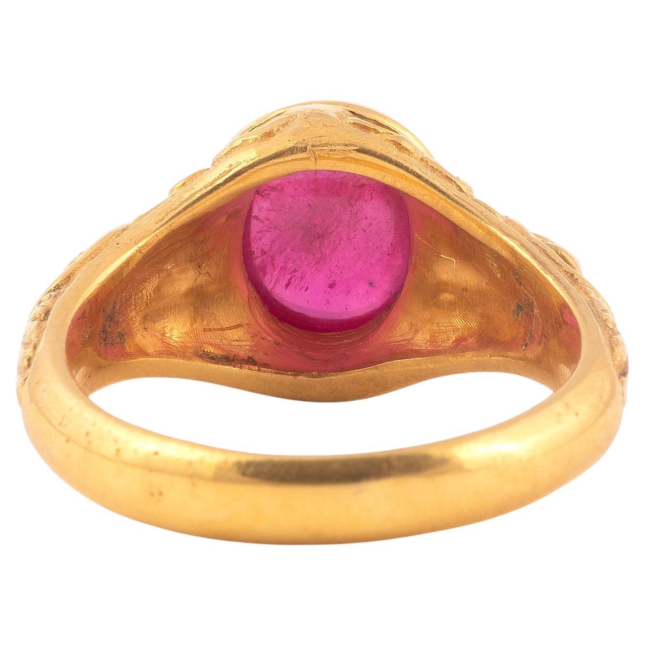 Neorenaissance-Ring mit Gold- und Rubinmasken (Cabochon) im Angebot
