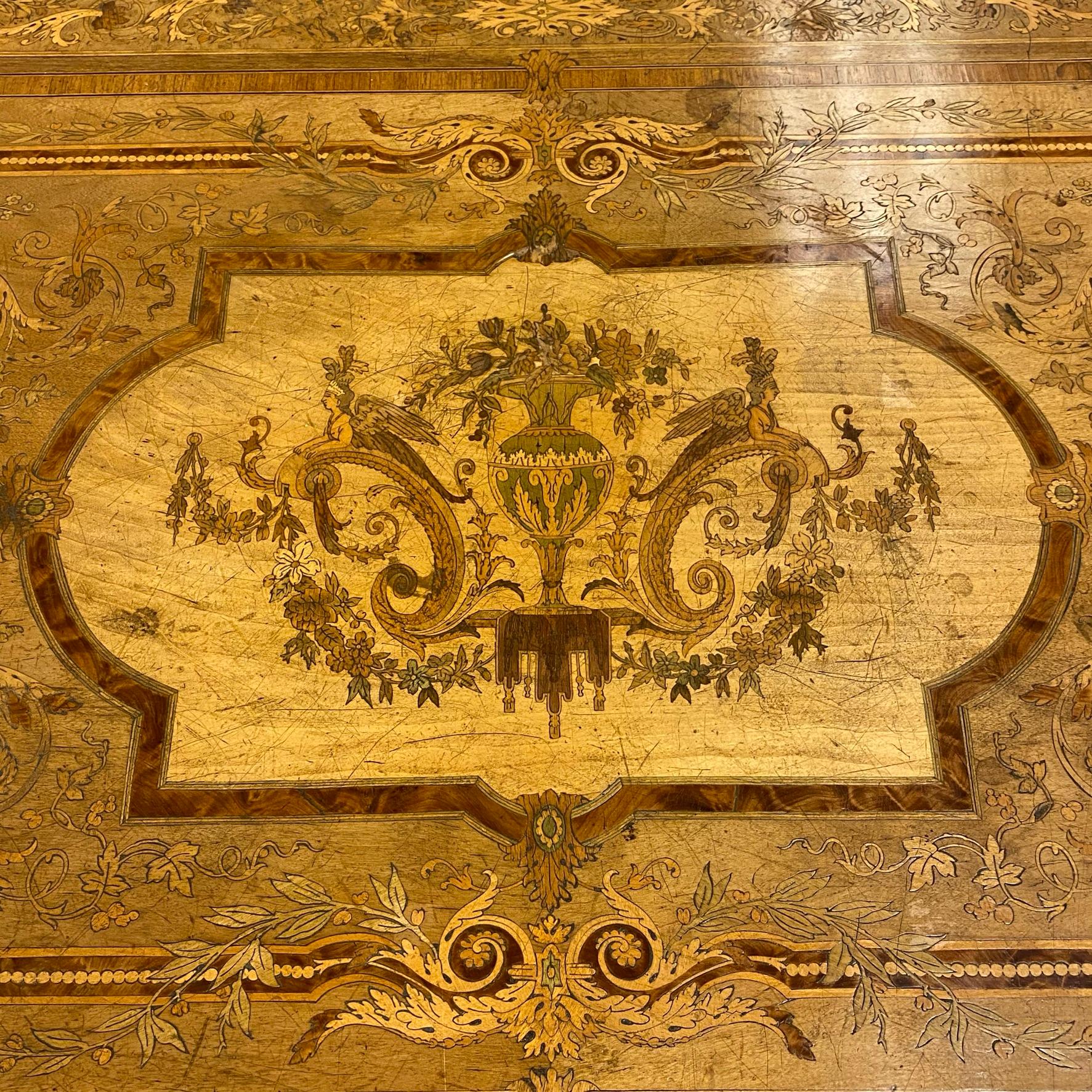 Very fine quality 19 century French Renaissance Revival gilt bronze mounted marquetry inlaid rectangular center table.